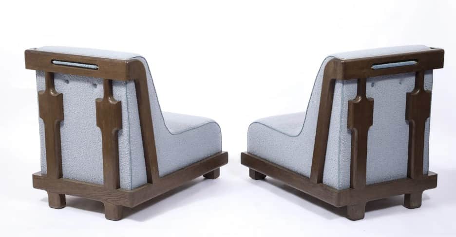 A contemporary low-profile, armless lounge chair featuring a light blue upholstered seat and backres… — 3D model