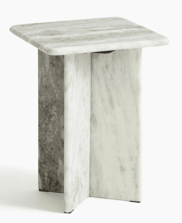 A contemporary accent table constructed entirely from natural marble, featuring a rectangular top wi… — 3D model
