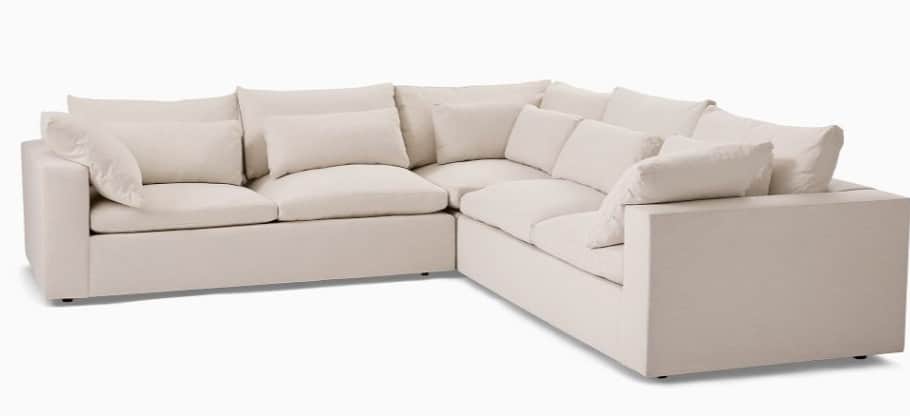 A large, L-shaped sectional sofa featuring deep, plush seating and back cushions. The sofa is uphols… — 3D model