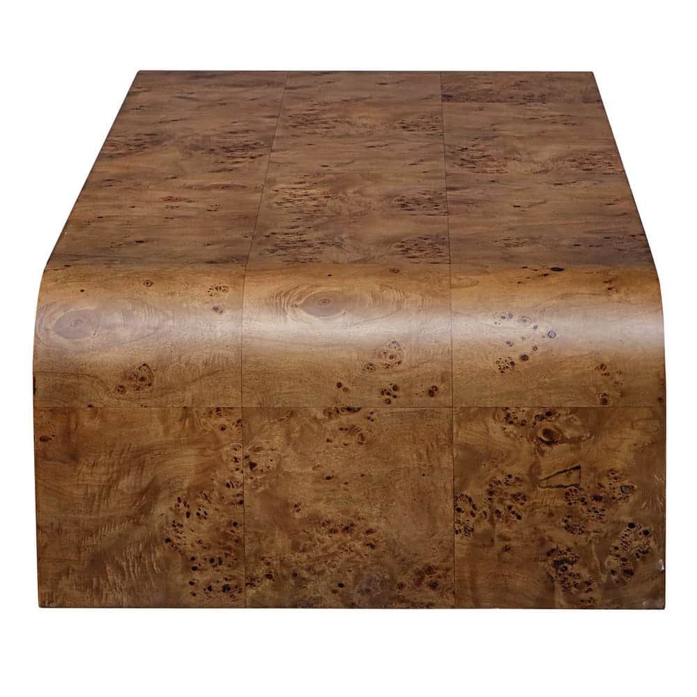 A wooden coffee table with a distinctive burl wood veneer. The table has a rectangular top and a cur… — 3D model