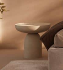 A light gray or off-white modern cylindrical pedestal accent table featuring a round, slightly dishe… — free STL 3D model
