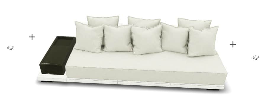 A contemporary, low-profile sofa with a modular design. It features a white base frame and a large,… — 3D model