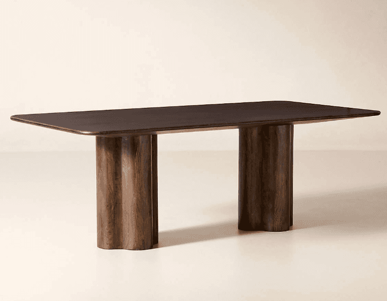 A dark stained wooden dining table featuring a rectangular top with rounded corners, supported by tw… — 3D model