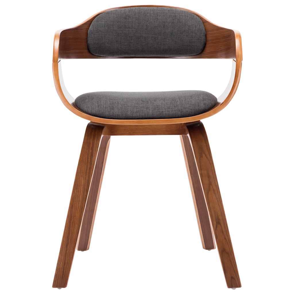 A modern accent chair with a curved wooden frame and upholstered seat and backrest. The chair featur… — 3D model