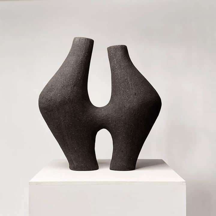 A modern abstract sculptural object, appearing to be a dual vase or decorative piece, rendered in ma… — 3D model
