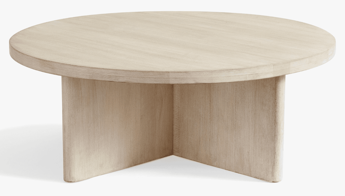 A round, low-profile coffee table crafted from light-colored, bleached wood. Its design features a t… — free BLEND 3D model