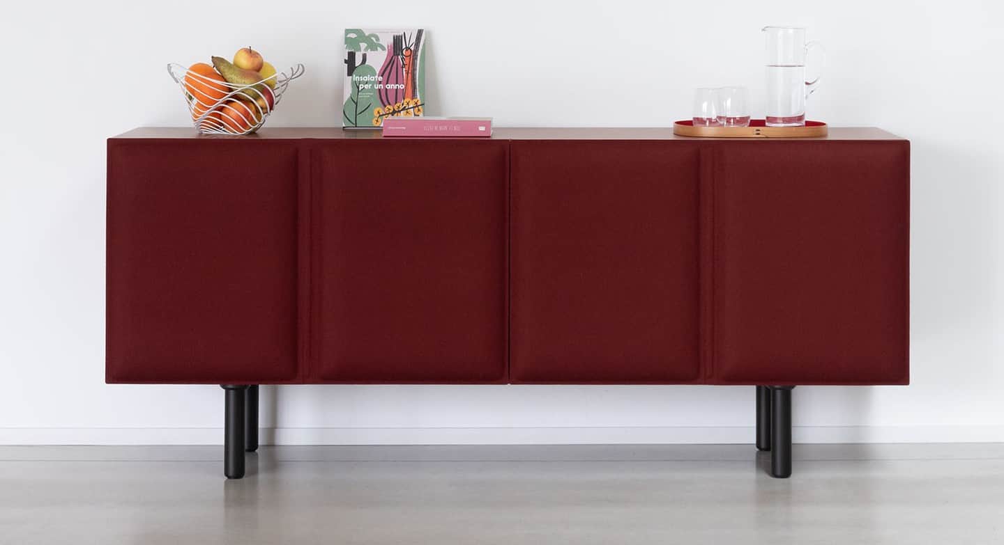 A modern, rectangular sideboard featuring a dark wood top and side panels, with three distinct front… — free STL 3D model
