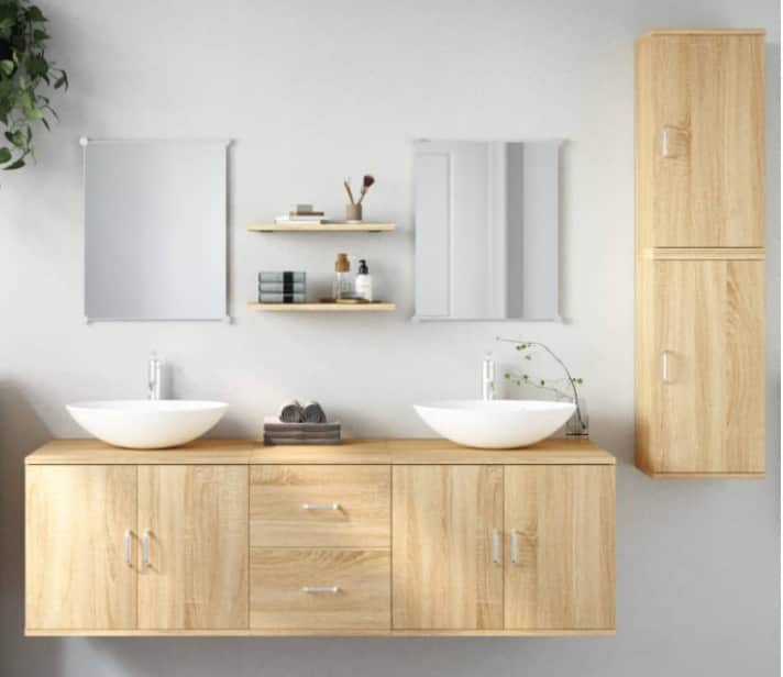 A modern, wall-mounted double basin bathroom vanity featuring a light wood-look laminate finish. The… — 3D model