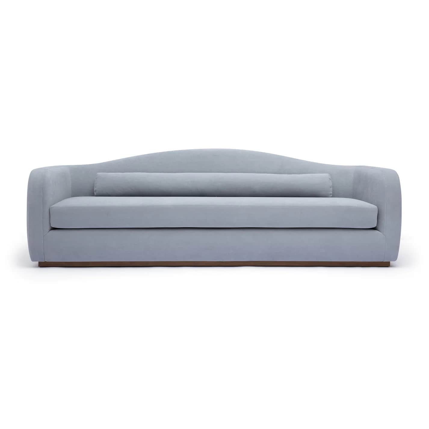 A modern upholstered sofa in a light blue color, featuring a subtly curved backrest, rounded track a… — 3D model