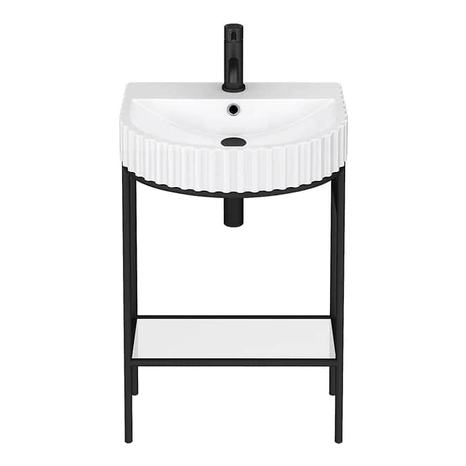 A modern freestanding bathroom vanity featuring a white ceramic basin with a distinctive fluted exte… — 3D model
