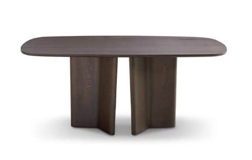 A contemporary dining table with a distinctive organic, elongated oval tabletop and a unique, sculpt… — 3D model