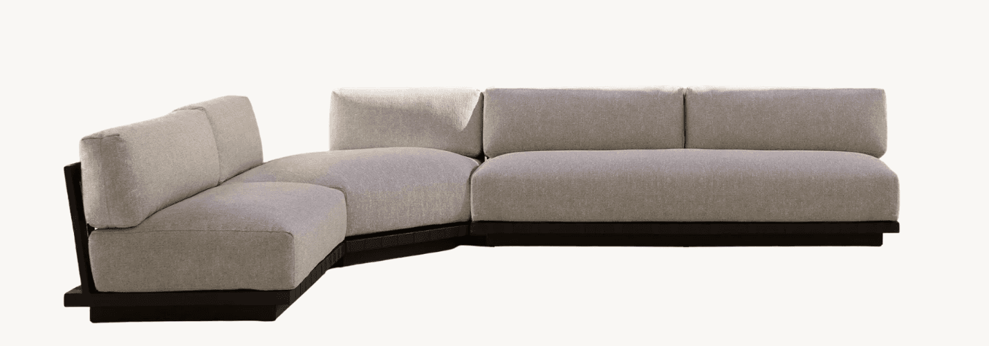 A contemporary L-shaped sectional sofa featuring light grey fabric upholstery and a dark wooden plat… — 3D model