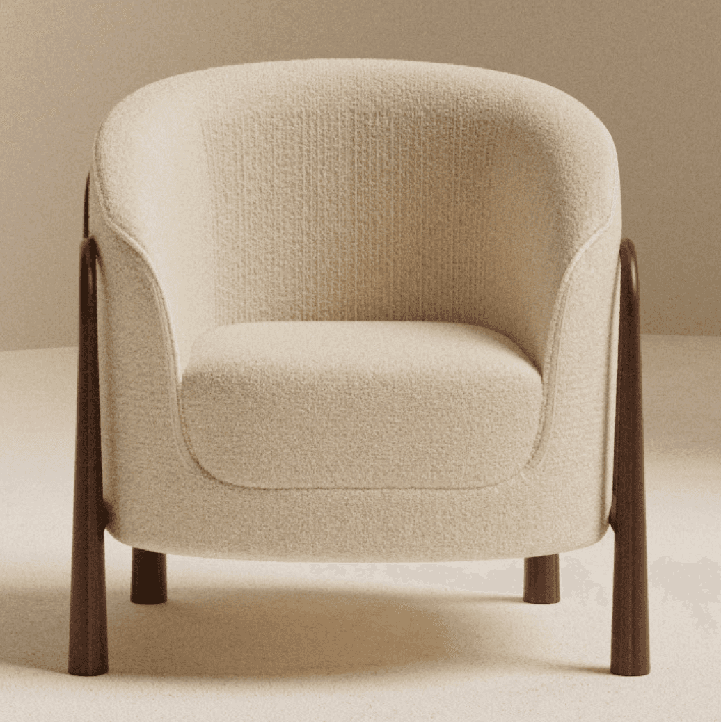 A contemporary accent armchair featuring a rounded, upholstered body covered in a cream-colored, tex… — 3D model