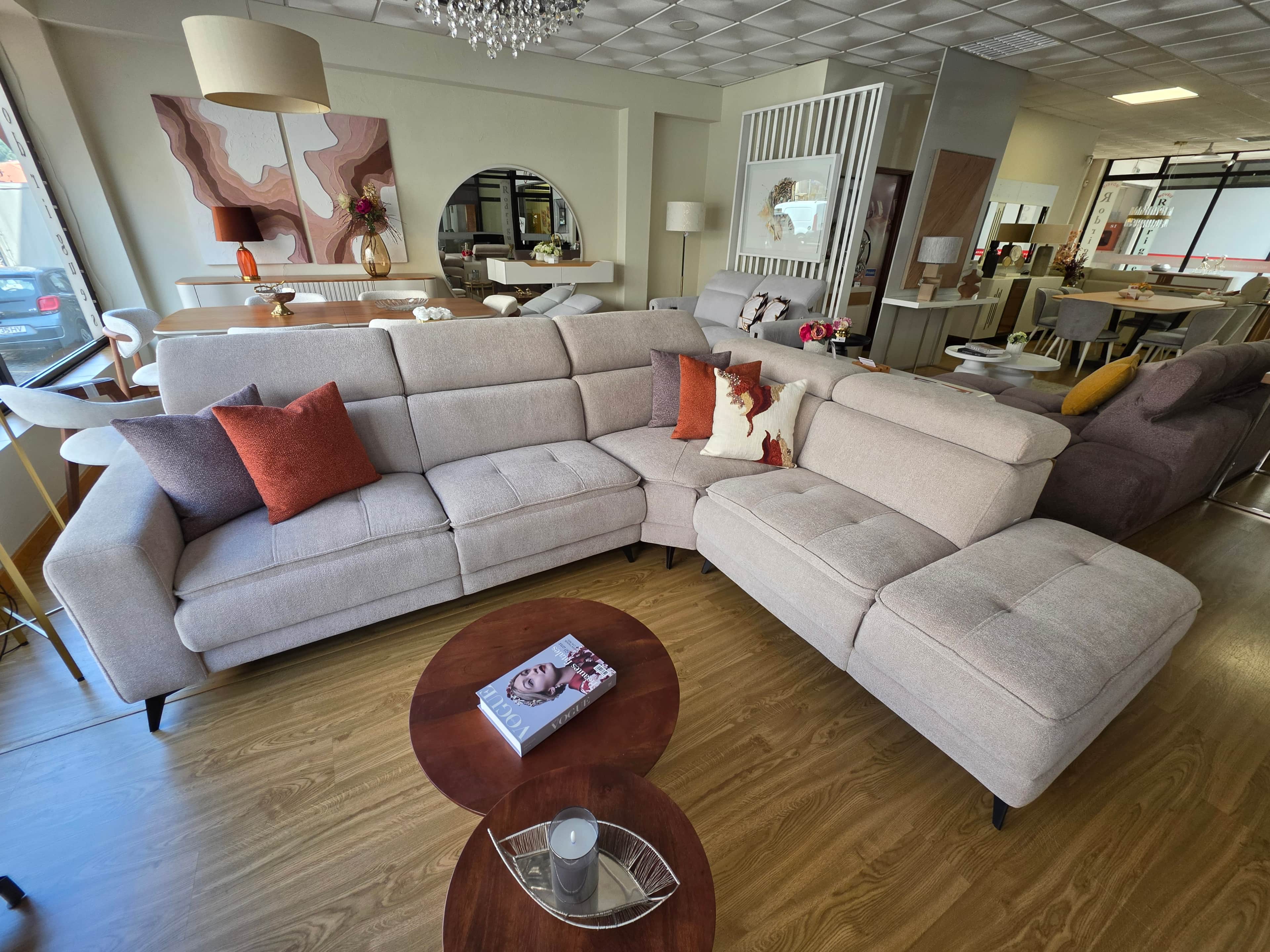 An L-shaped sectional sofa upholstered in a light beige or off-white fabric. The sofa features sever… — 3D model