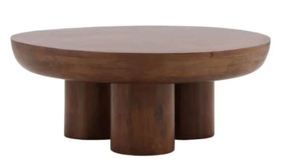 A wooden coffee table with a round, slightly dished tabletop and three cylindrical legs. The wood ha… — free FBX 3D model