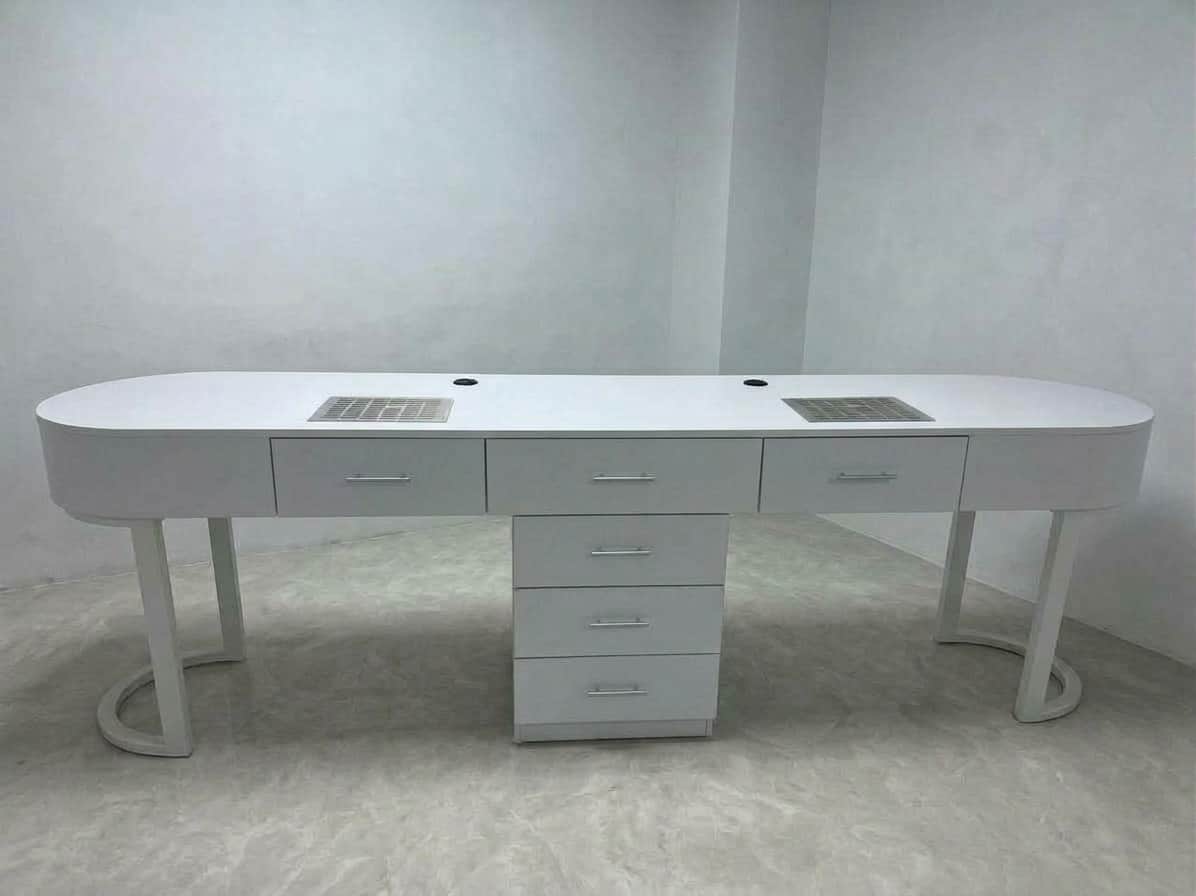A modern, sleek, white double manicure table featuring an elongated, oval-shaped tabletop. It incorp… — free BLEND 3D model