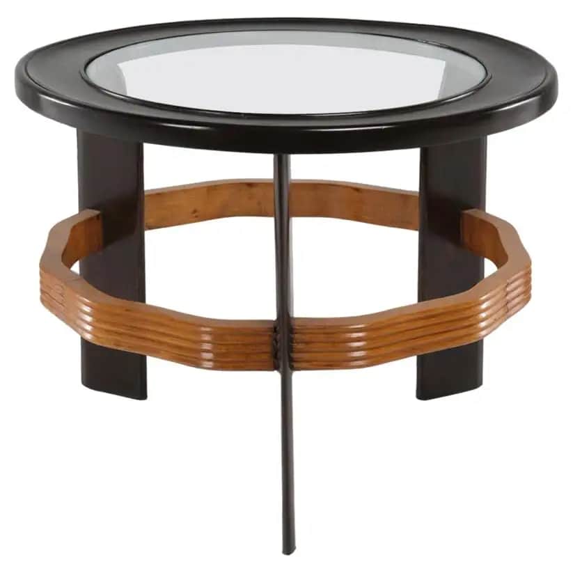 A round accent table featuring a black lacquered wood top with a recessed glass insert. The base con… — free STL 3D model