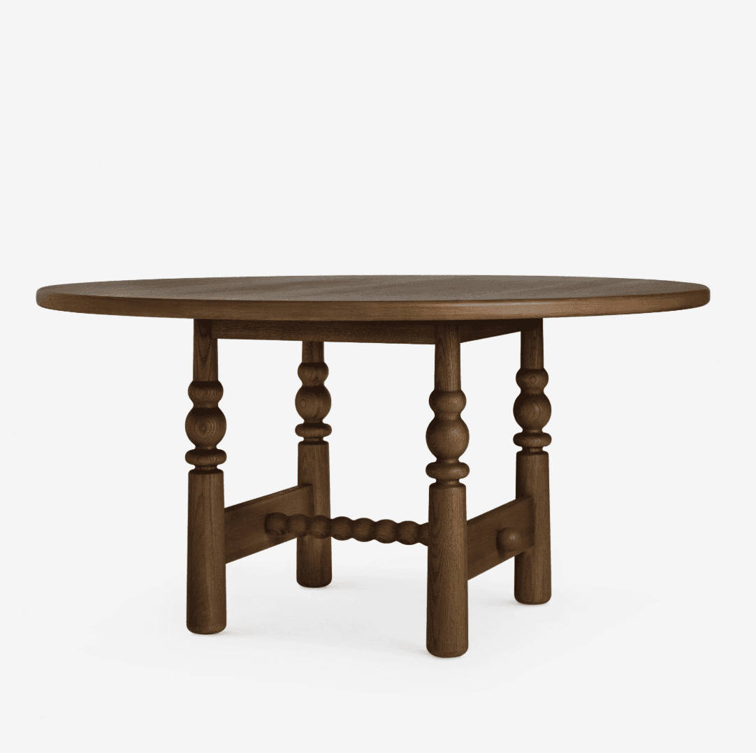 A round dining table constructed from dark-stained wood, featuring a thick circular tabletop support… — 3D model
