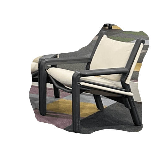 A modern armchair with a dark gray metal frame and a light cream-colored fabric seat and backrest. T… — free BLEND 3D model