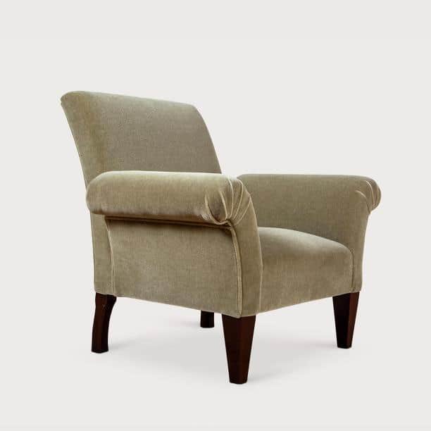 A fully upholstered armchair featuring distinct rolled arms and exposed dark wooden legs. The chair… — 3D model