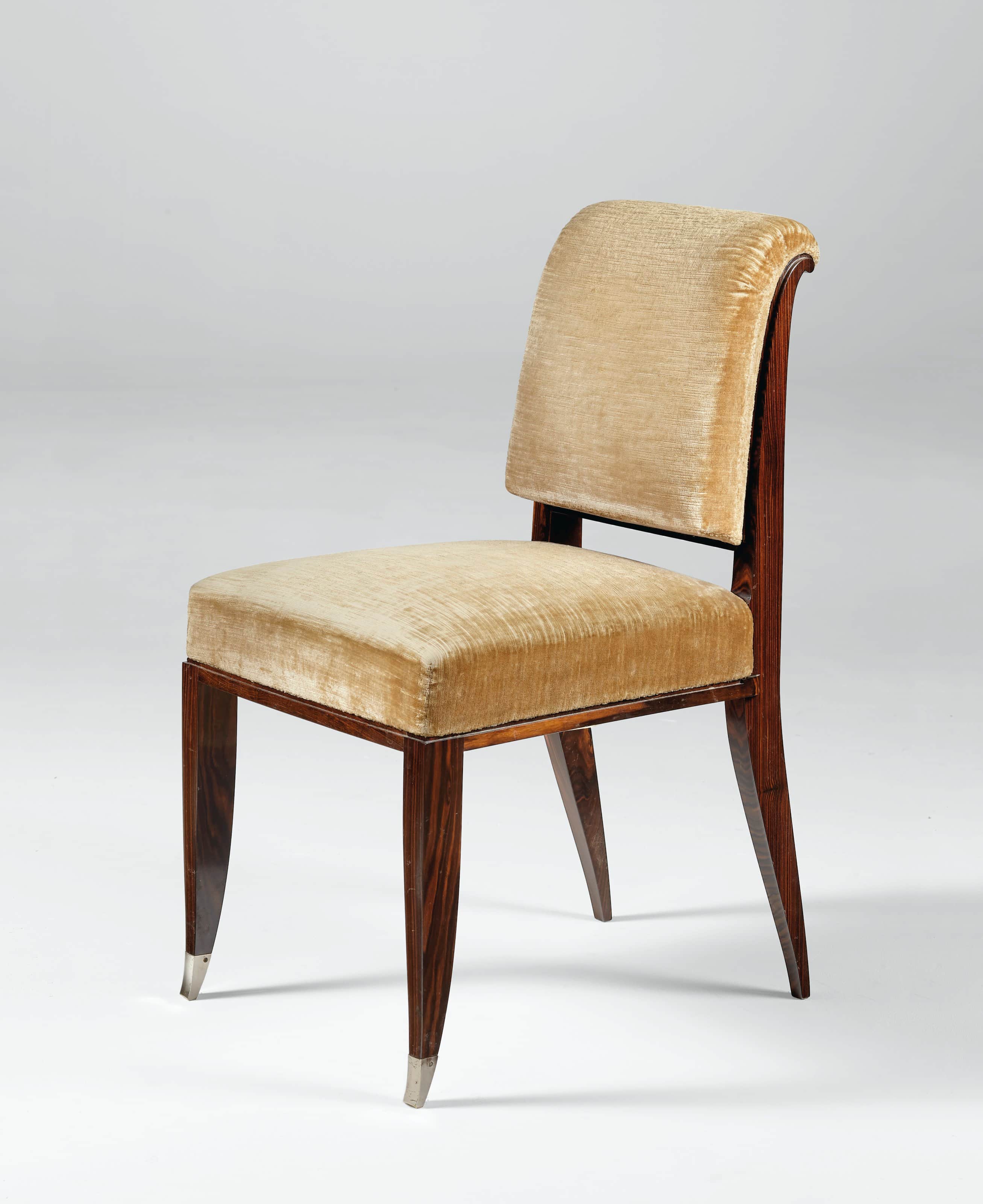 A vintage upholstered chair with a dark wooden frame and a curved backrest. The seat and backrest ar… — free GLTF 3D model