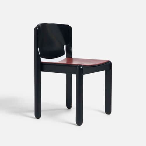 An armless chair featuring a bold, blocky black lacquered frame with a contrasting red leather or fa… — free FBX 3D model