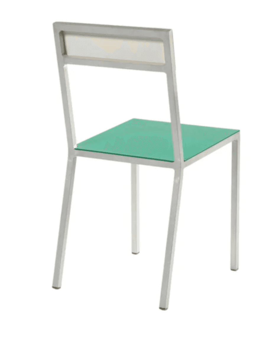 A modern side chair with a minimalist design. The frame is constructed from silver-toned metal, like… — 3D model