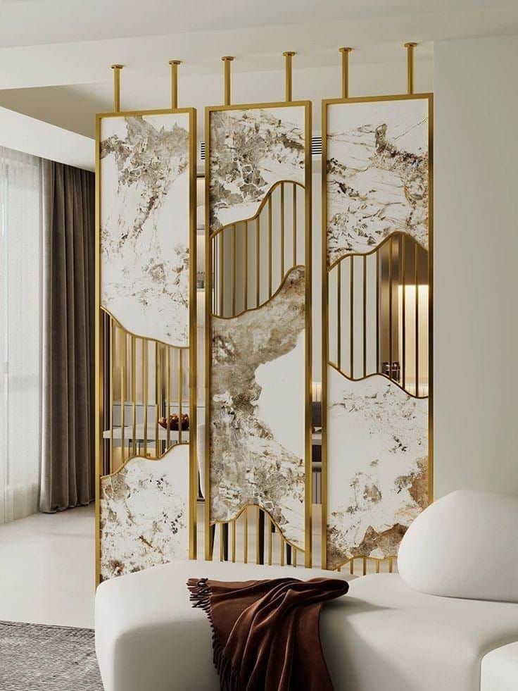 A set of three decorative room divider panels, each featuring a polished brass frame with sections o… — 3D model