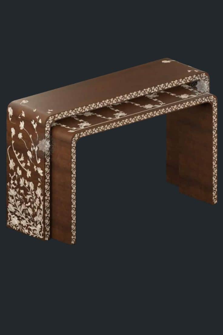 A set of two nesting tables featuring a dark brown wood finish adorned with intricate floral and vin… — 3D model