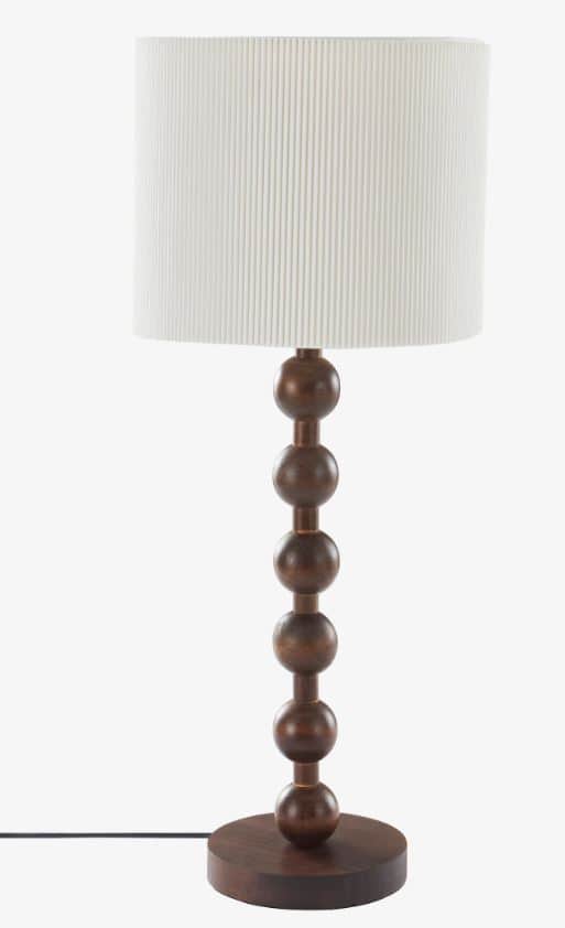 A table lamp featuring a distinctive dark wood base constructed from five stacked spherical elements… — 3D model