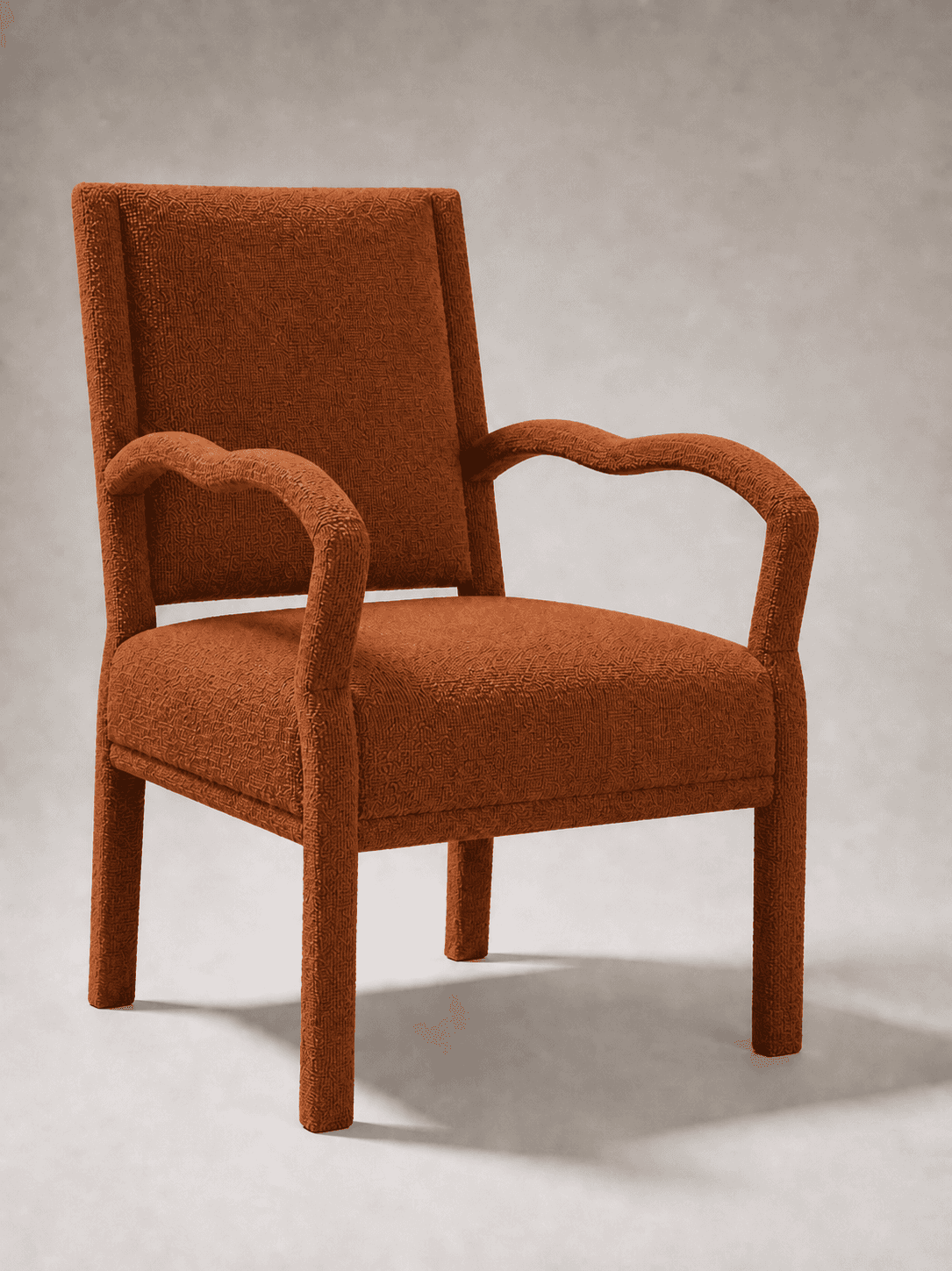 A fully upholstered armchair with a high back and curved arms. The chair features a textured fabric… — 3D model