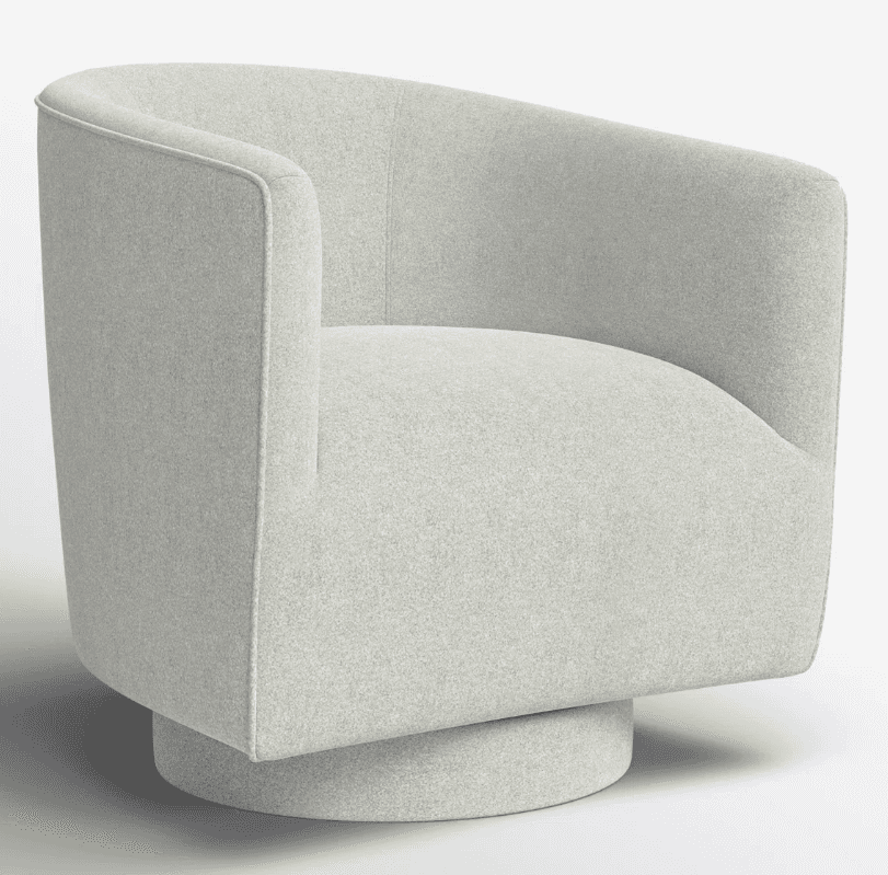 A modern armchair with a swivel base. The chair features a rounded, enveloping silhouette with uphol… — 3D model