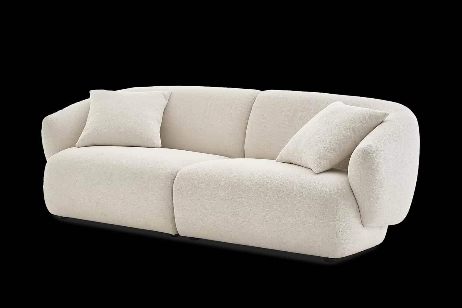 A contemporary two-seater sofa featuring soft, rounded lines and upholstered in a textured cream bou… — 3D model