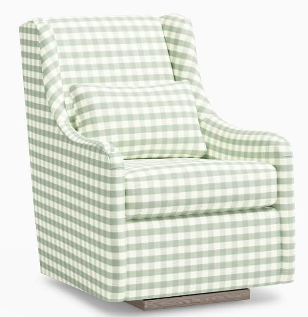 A wingback armchair upholstered in a green and white gingham fabric. It features a high back with wi… — 3D model