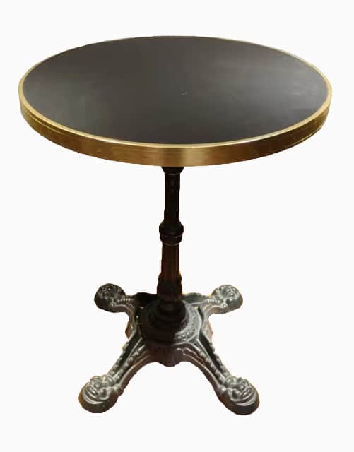 A round side table with a dark-colored tabletop, a brass-colored rim, and an ornate, dark-colored pe… — 3D model