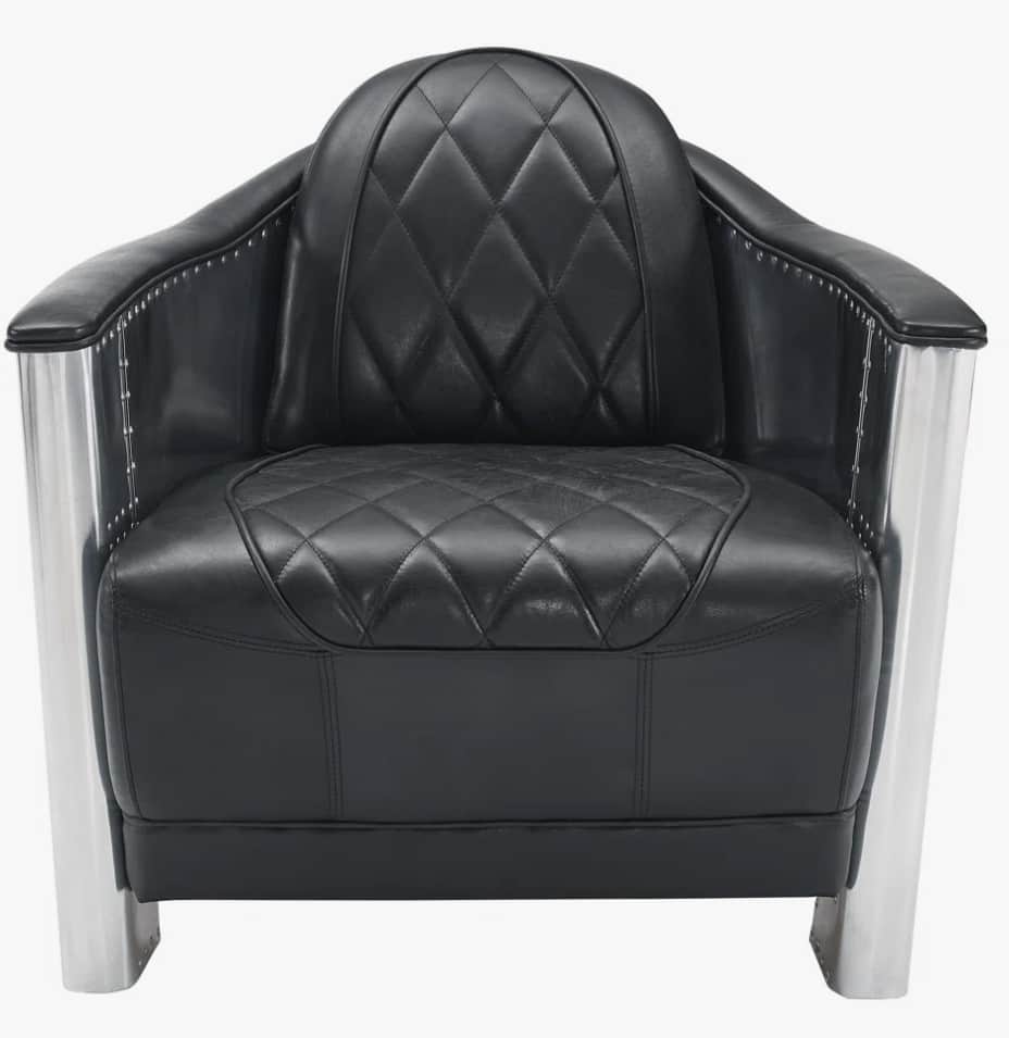A black leather armchair with a diamond-stitched pattern on the seat and back. The armchair features… — 3D model