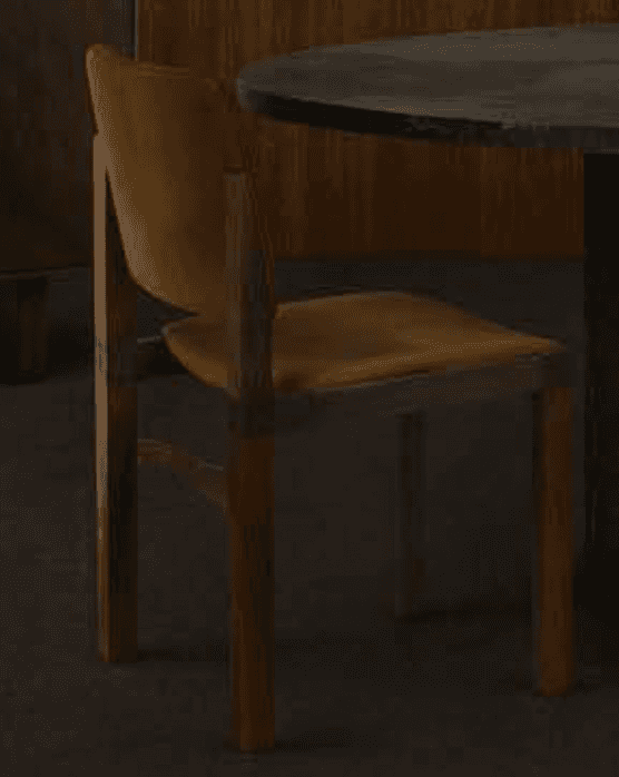 A modern dining chair featuring a minimalist design with a solid wood frame and upholstered seat and… — 3D model