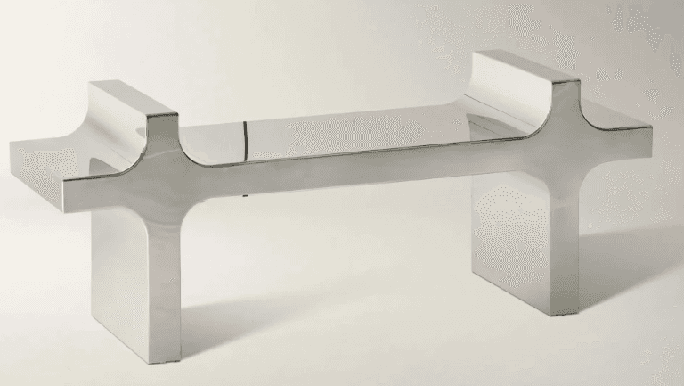 A modern console table with a polished chrome finish. The table features a linear top supported by t… — 3D model
