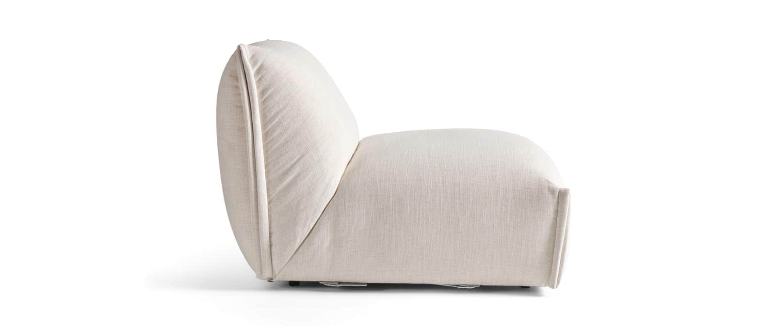A low-profile, armless lounge chair upholstered in a light, textured fabric, featuring a softly curv… — 3D model