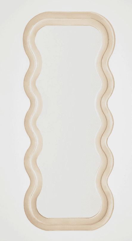 A decorative mirror with a unique, undulating frame. The frame has a soft, plush appearance and foll… — 3D model