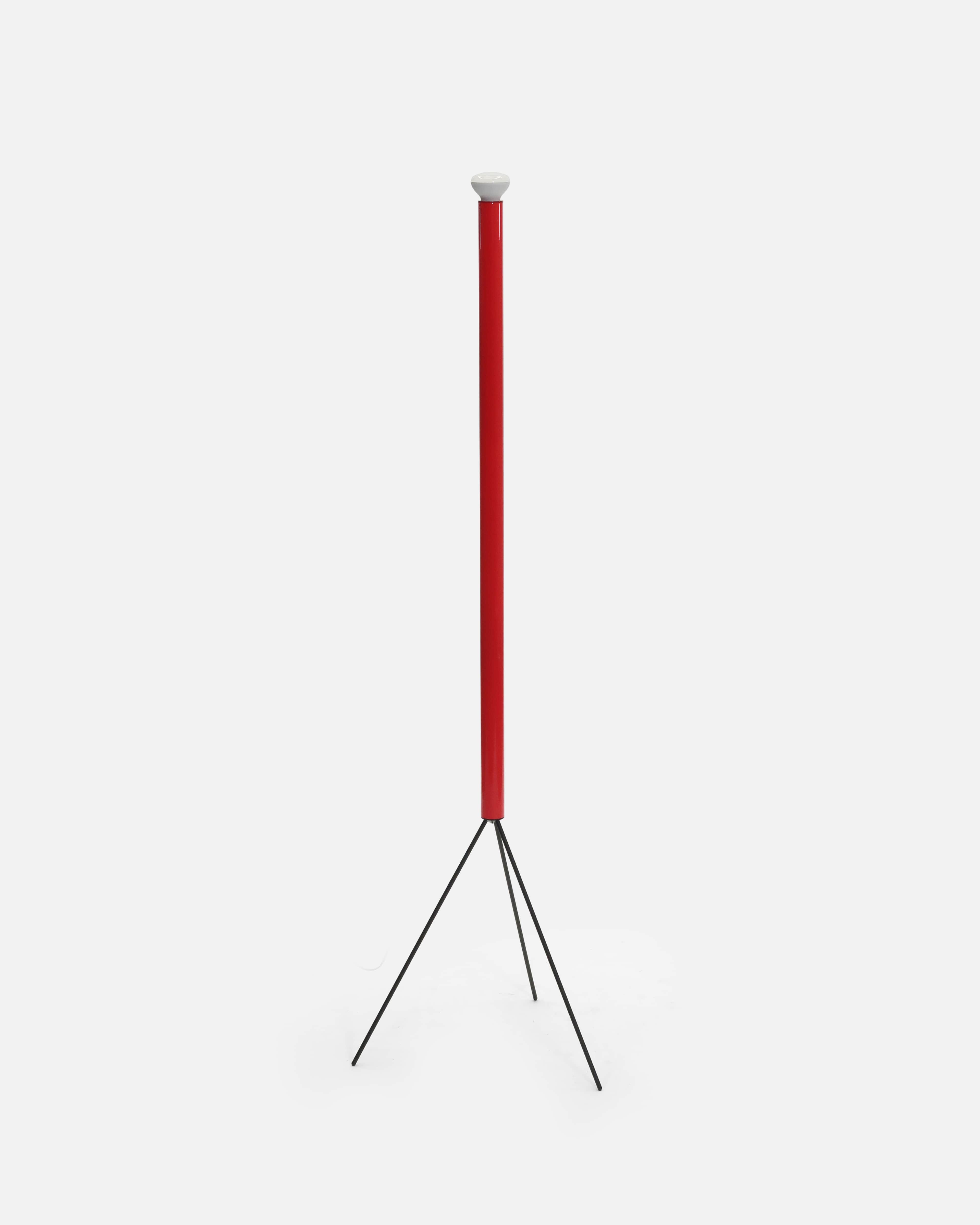 A modern floor lamp featuring a tall, slender red cylindrical column that houses the light source, s… — 3D model