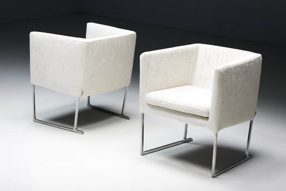 Two upholstered armchairs with a minimalist design. Each armchair features a fully upholstered seat,… — free OBJ 3D model