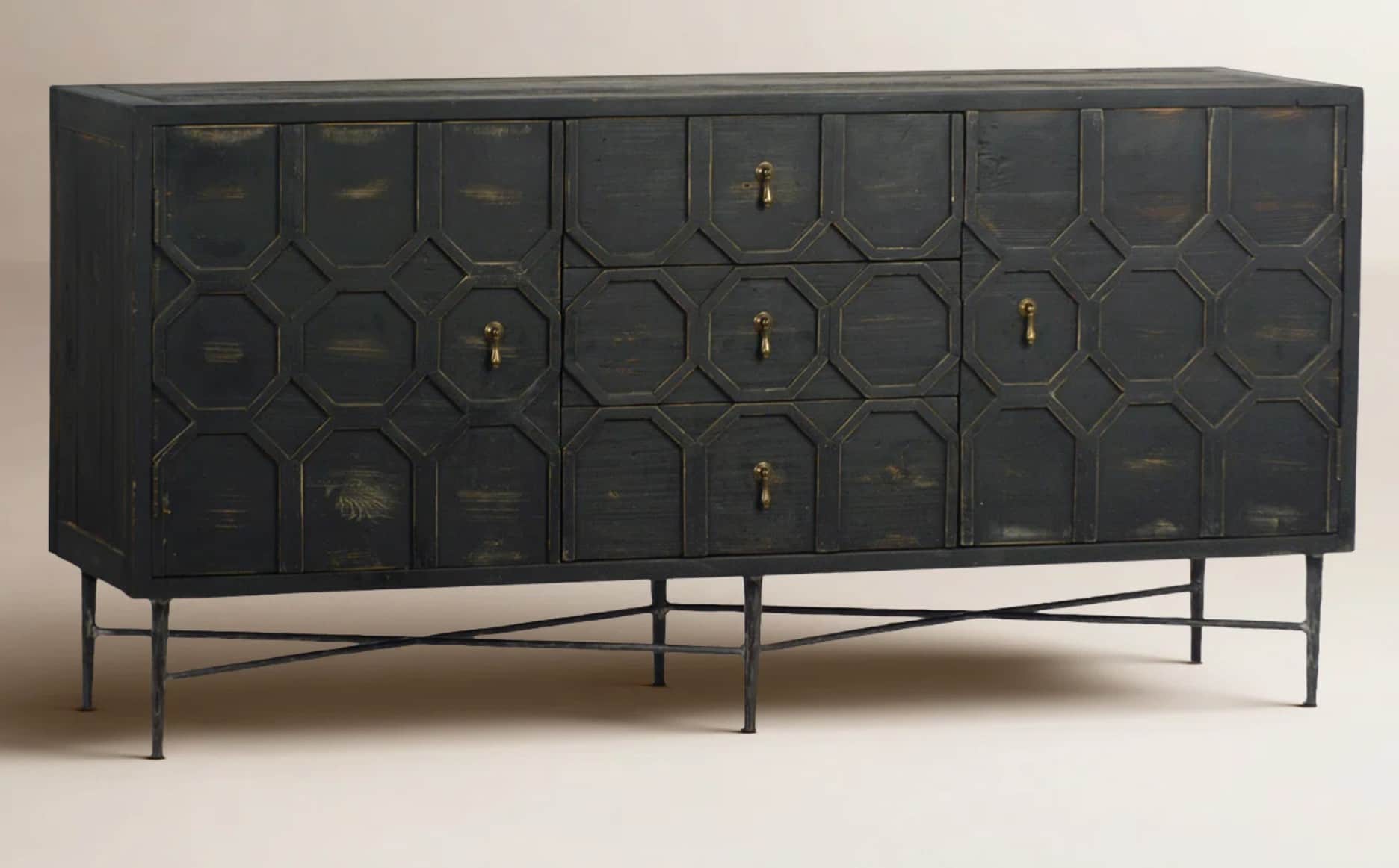 A long, rectangular sideboard with a dark, distressed finish and a geometric overlay pattern on the… — 3D model