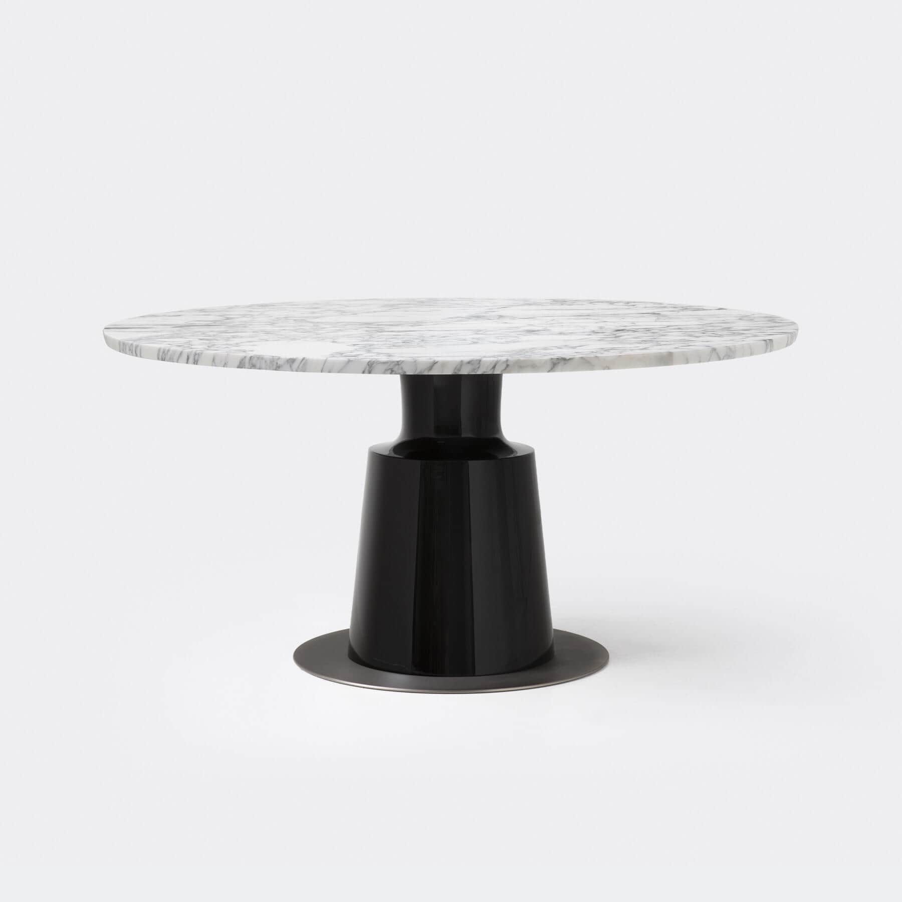 A modern round table featuring a white marble top with grey veining, supported by a glossy black, ta… — free SKP 3D model