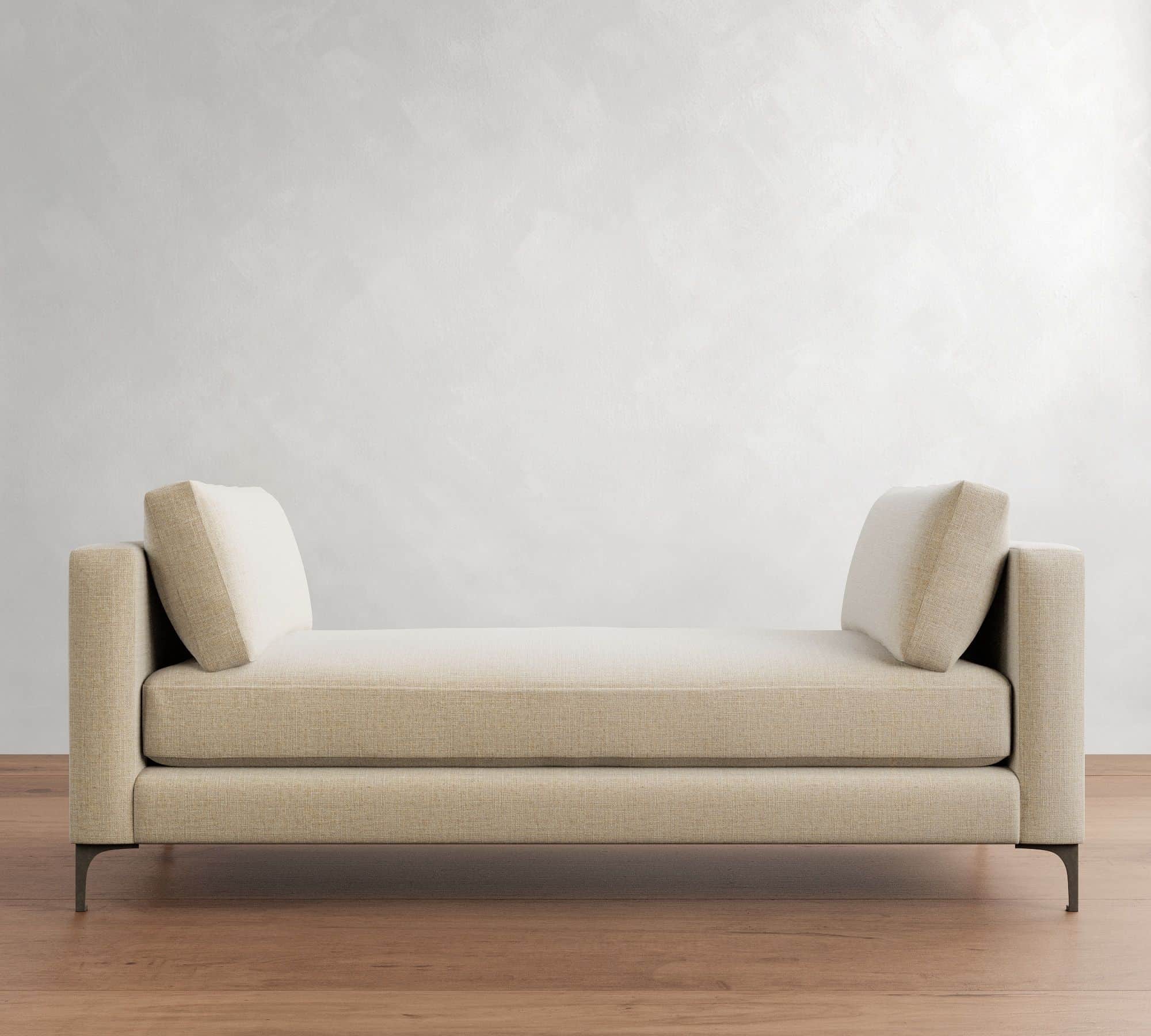 A contemporary upholstered daybed with integrated armrests at both ends, featuring a flat seating su… — 3D model