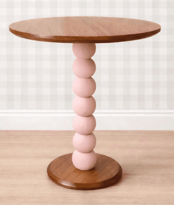 A modern round side table featuring a distinct spherical pedestal base. The circular tabletop and th… — 3D model