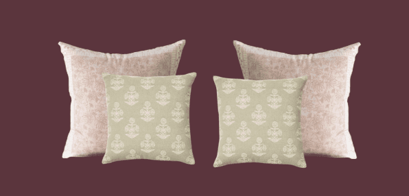 Two pairs of decorative cushions are presented against a solid dark pinkish-purple background. The f… — 3D model