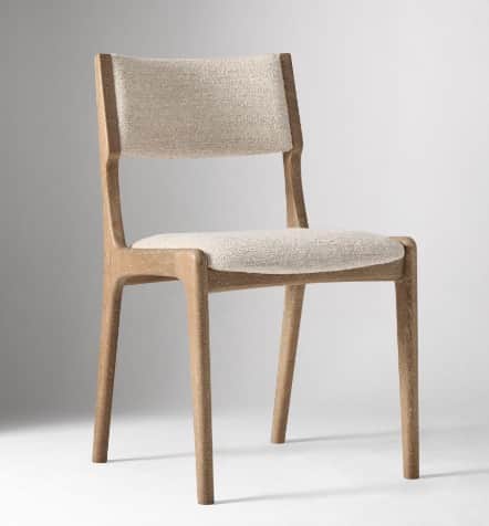 A modern dining chair with a solid wood frame and upholstered seat and backrest. The chair features… — 3D model