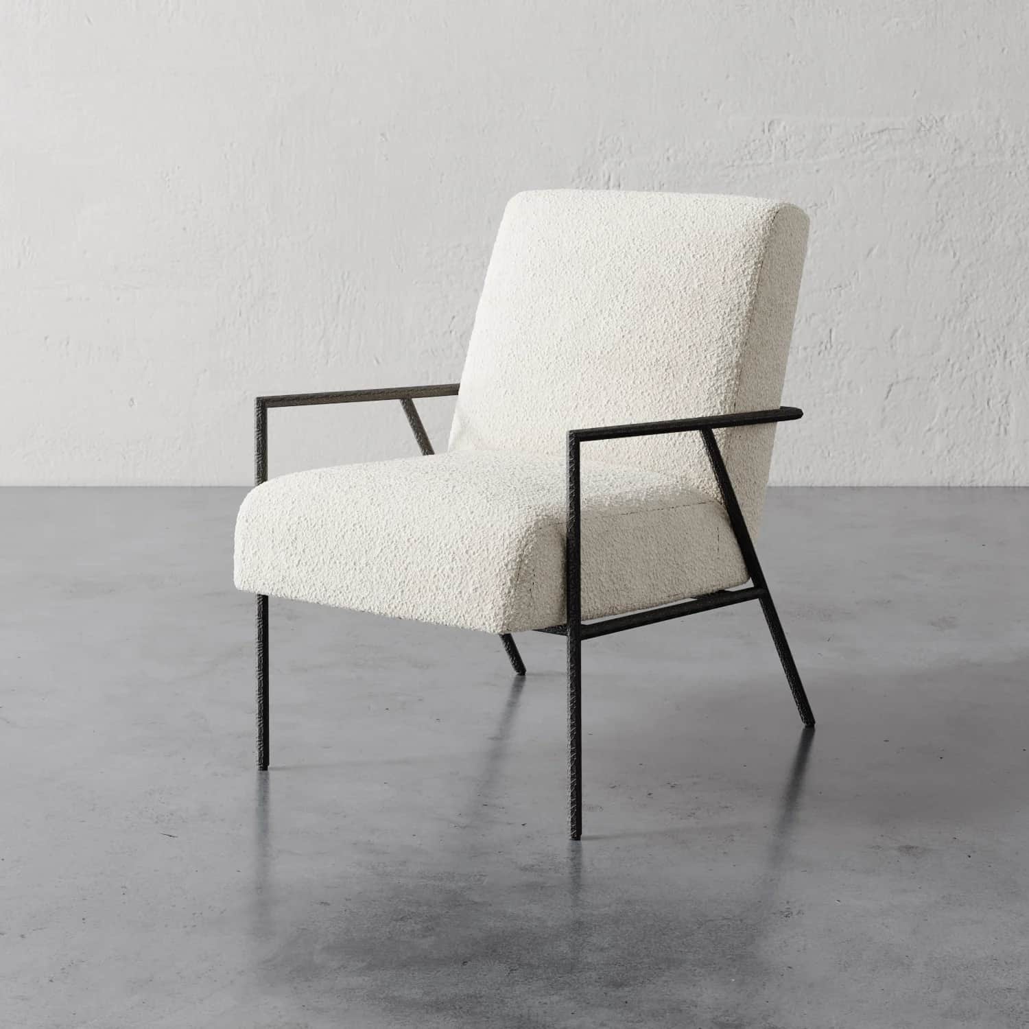 A modern armchair featuring a textured boucle fabric upholstery in off-white. The chair has a high b… — 3D model