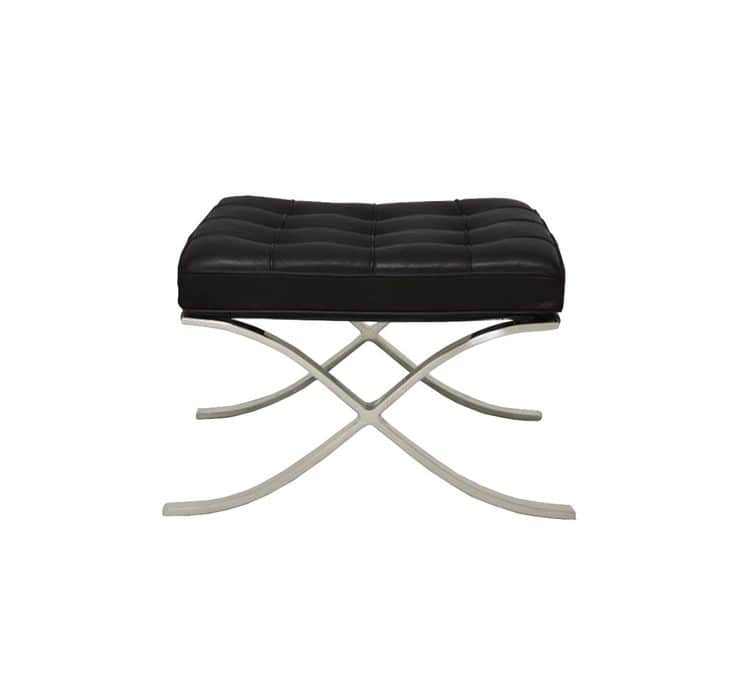 A rectangular ottoman with a tufted, dark-colored upholstered top and a sculptural, X-shaped metal b… — 3D model